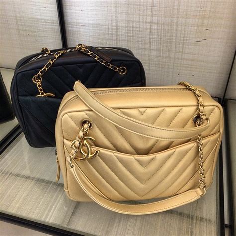 chanel chevron puffy bag|Chanel Chevron camera bag.